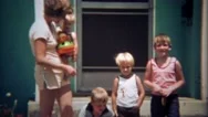 1979: Single Women Takes Care Of Four Children On A Summer Afternoon. Stock Footage