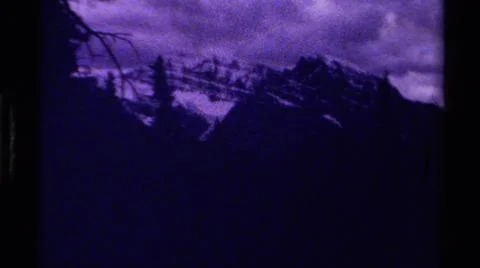 1979:CANADA.Dark Foreboding Shots Of Mountainous Terrain With A Cloudy Sky Stock Photos