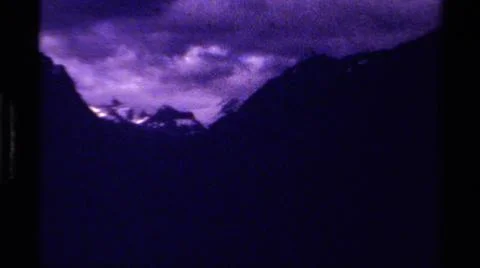 1979:CANADA.Dark Foreboding Shots Of Mountainous Terrain With A Cloudy Sky Stock Photos