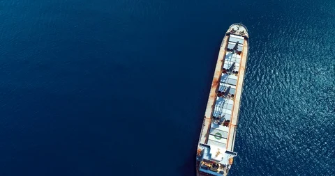 198 Aerial top view with a bulk cargo ship at sea , cinematic 4k Stock Footage 88080345