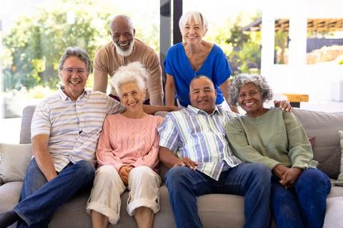 Portrait of happy multiracial male and female senior friends relaxing in living room at nursing home. Smiling, sofa, window, unaltered, togetherness, support, assisted living and retirement concept. xkwx Medium Group Of People, Mature Adult, Man, Male, Caucasian, Senior, Elderly, Black, Mixed-Race, Woman, Female, People, Portrait, Happy Multiracial, Male Female, Friend, Relaxing, Living Room, Nursing Home, Smiling, Sofa, Window, Unaltered, Togetherness, Support, Assisted, Retirement, Couch, Young, Cheerful, Happy, Apartment, Adult, Comfortable, Retired, Together, Happiness, Attractive, Furniture, Person, Indoors, Lounge, Room, Home, Armchair, Friendship, Sitting, Multiracial, Living, Nursing