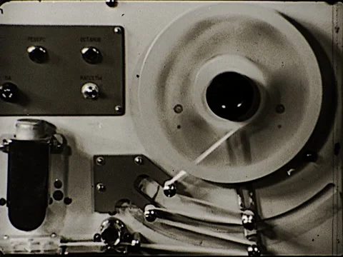 1980s Early Computer Storage Tapes Data Reels Spin Vintage Old Film Movie 16mm Stock Footage 153880808