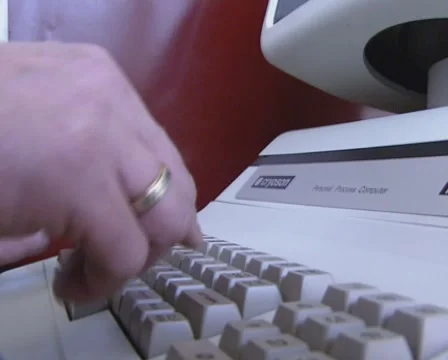 1980s industrial computer keyboard, input data using index finger Stock Footage 56852388