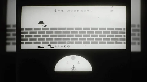 1980s Man Plays Computer Game Atari Desktop PC Vintage Old Film Movie Vidéo 87306613