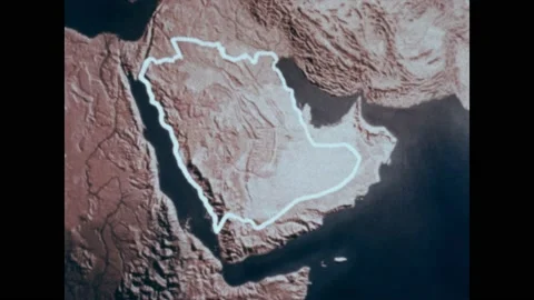 1980s: Map of Middle East, border around Saudi Arabia. Aerial shot of city. Men Stock Footage 219817912