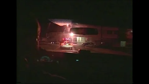 1980s - POV night footage of police heading towards a crime in New Orleans, Stock Footage