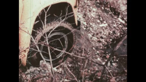 1980s: School bus teeters on cliff then stops. Boy stands and looks scared. Kids Stock Footage 243582950