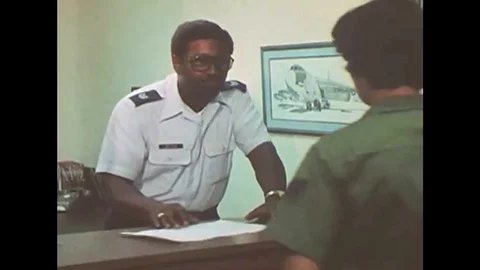 1980s - A servicewoman, under the eye of an observer, provides a urine sample Stock Footage 132203443
