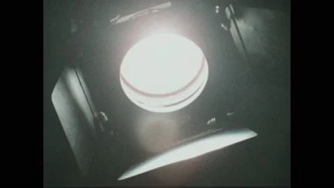 1980s: Studio light. Diagram of a triangular prism refracting white light. Stock Footage 220810597