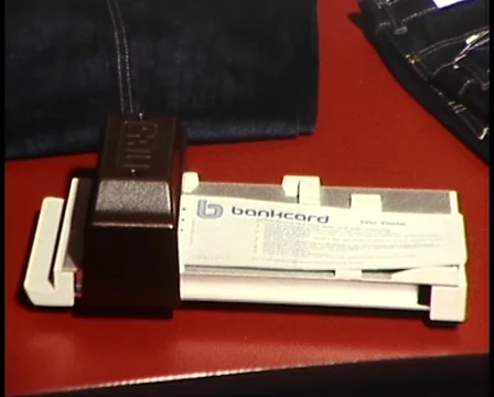 (1982) Bankcard System - Making a Purchase / Manual Imprinter Stock-Footage 46472205