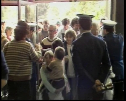 1983:  Doors Opened To Event / Crowds Enter Stock Footage 112492003