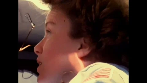 1984 - Space Shuttle Discovery astronaut Anna Lee Fisher observes as the Stock Footage 79613763