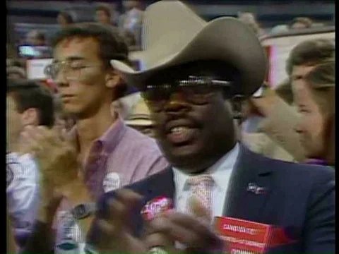 1984’Ronald Reagan speaks to a group of supporters at a campaign rally, and Ray Stock Footage