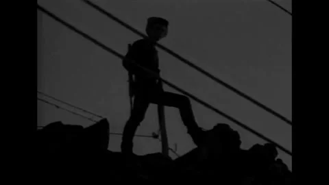 1987 - While Soviet soldiers patrol Afghanistan at night, resistance fighters Stock Footage 152629175