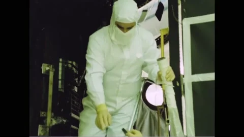1988 - NASA engineers work on the Hubble Space Telescope. Stock Footage 232851739