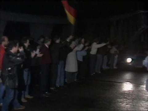 1989 FALL OF THE BERLIN WALL: crowds chanting 스톡 동영상 77871664