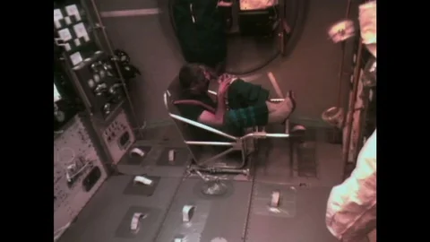 1990s: bone strength research in astronauts in sls1. Astronauts take samples in Stock Footage 75129657