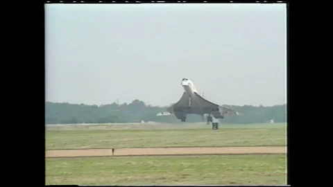 1990s: Concorde lands on runway. Stock Footage 113988441