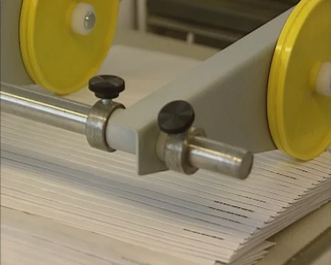 1990s conveyor transport - printer ejects envelopes Stock Footage 125435926