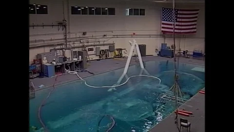 1990s: High angle view of pool in NASA training facility. Video stock 74700955