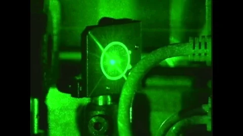 1990s: laser generates light. Gas charged laser. Computer animation of laser. Stock-Footage 75163900