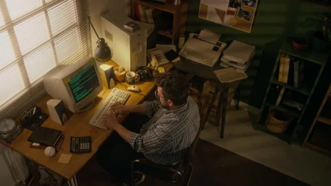 1990s Male Programmer Writing Code on Vintage Computer in Home Office Stock Footage 327239143