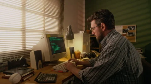 1990s Male Programmer Writing Code on Vintage Computer in Home Office Video stock 327239620