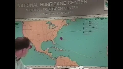 1990s: map on wall of National Hurricane Centre. Computers in office. Computer Stock Footage 75128147