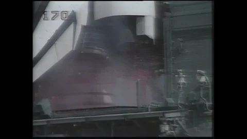 1990s: Rocket engines firing. Rocket lifts from launchpad. Rocket launching. Stock Footage 129277349