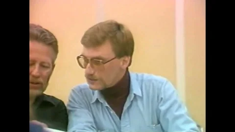 1991 - A thermal analyst uses a computer program to explain his work designing Stock-Footage 93332039