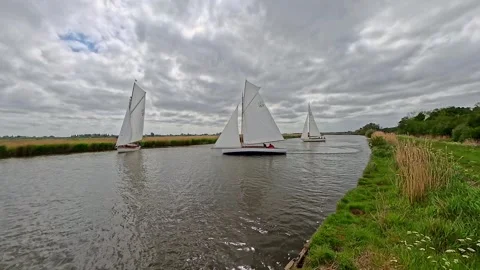 19.River Cruiser sracing down the River Bure during the 2025 Acle Regatta on Video stock 309833403