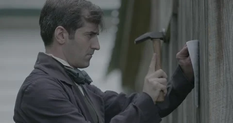 19th Century Man posting a Paper Notice to a Wall - Slaves Running for freedom Stock Footage 211440142