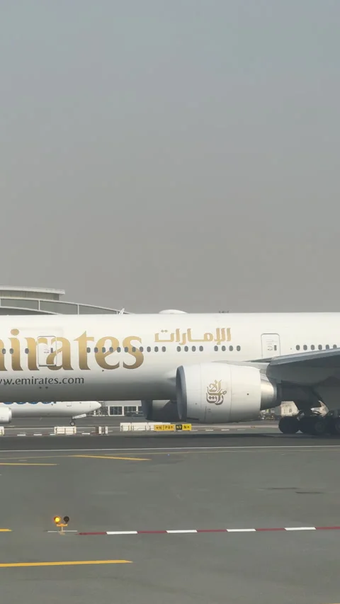 19th December 2025 -  Dubai, UAE. Emirates plane taxing to the runway. 스톡 동영상 332553916