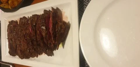 1kg Tagliata beef cut dinner at an Italian restaurant in Malta Stock Photos