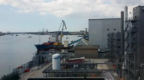 1m10s Cargo Crane Ship Loading at a Refinery Dock In Amsterdam Silent Stock Footage 47755332