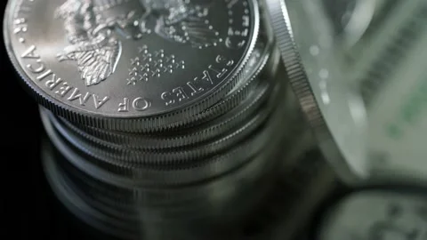 1oz Silver Dollar Eagle Coins with One Dollar Banknode Currency Finance Stock Footage 224290589