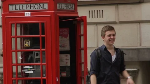 2 in 1 October 2011, London, Britain, UK, United Kingdom - Traditional red phone Stock Footage