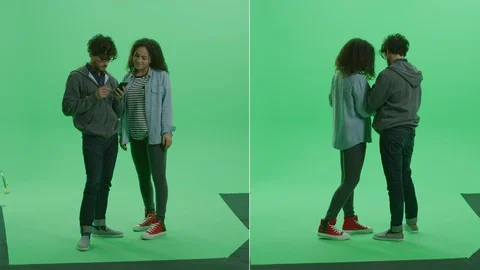 2-in-1 Split Green Screen Collage: Young Boy, Girl Talking, Have Fun Check Media Stock Footage 129409672