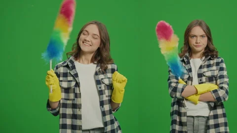 2-in-1 Split Green Screen Montage.A Portrait of Young Woman With a Dustpan. Video stock 249419634