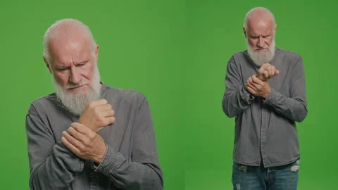 2-in-1 Split Green Screen Montage.Portrait of an Old Man Having Tunnel Syndrome. Stock Footage 263391388