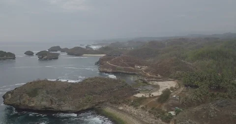 2. aerial view, bird view, descending towards the waves to the beautiful whit Stock Footage 121700300
