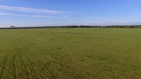 AN-2 aircraft is taking off Stock Footage 95760125