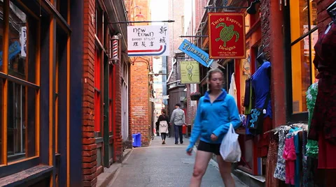 2 angles - people walking in fan tan alley Stock Footage 37703514
