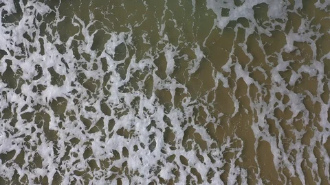 2 Athlantic ocean waves top view reaching shore drone aerial Stock Footage 100202163