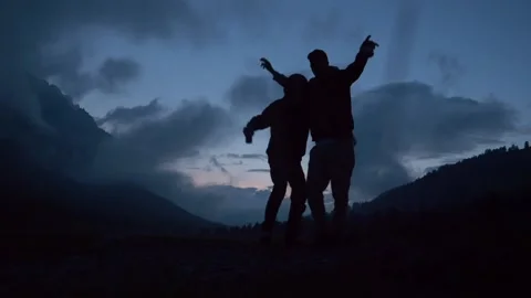 2 best friends dancing in mountain valley (slow-motion) Stock Footage 160499982