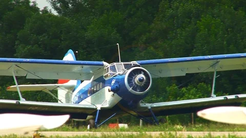 An-2 biplane passes on the runway after landing. Close-up. Stock Footage 106607624