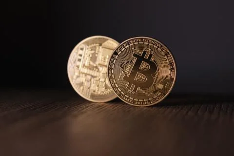 2 bitcoin coins standing next to each other Stock Photos