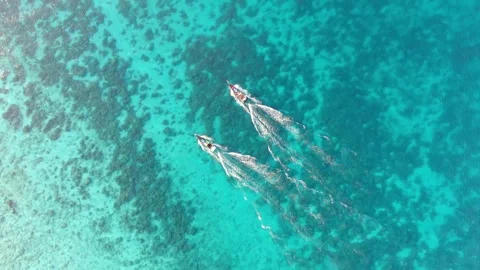 2 BOAT ON THE SURFACE PASSING Stock Footage 276559511