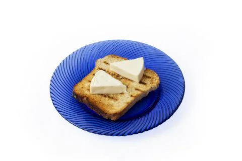 2 cheese triangles on a toasted slice of bread Stock Photos