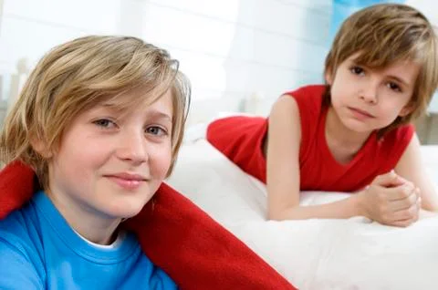 2 children at home looking at the camera Stock Photos